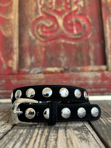 A sleek black leather skinny belt lined with a single row of polished dome silver studs — effortlessly edgy, endlessly versatile. The silver buckle ties it all together for a look that moves from casual to country-chic without missing a beat.