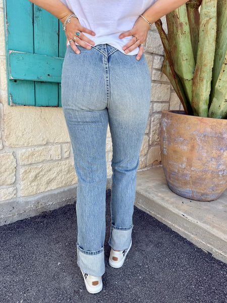 Ladies Cruel Denim Jean in light blue, high-rise fit for flattering shape, angled pockets and V-yoke stitching for western flair, rolled cuffs for styling versatility - CB74654001. Available at Blair's Western Wear, Marble Falls, TX.