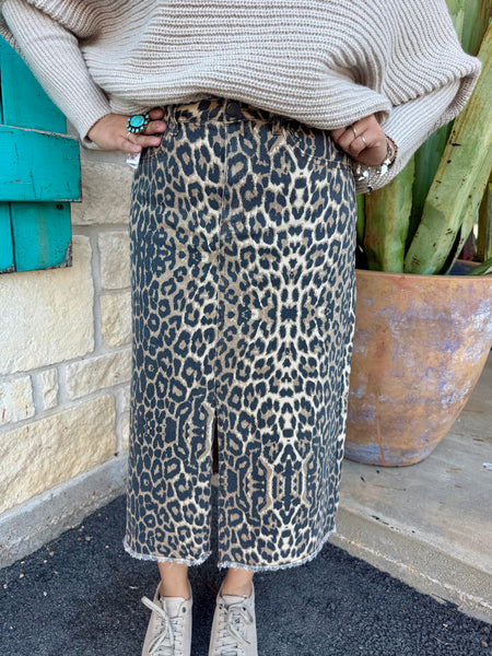 This Easel Denim Leopard Skirt features a light-wash finish, a flattering high-waisted silhouette, and a stylish front slit for easy movement. With a raw-edge hem, classic pockets, and soft stretch denim, it’s the perfect blend of comfort and casual, on-trend style. Available at BLAIR'S Western Wear located in Marble Falls TX.
