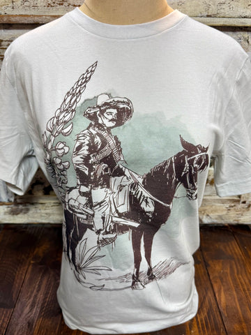 Ladies Emily short sleeve graphic tee cowboy Pancho in natural/sage, soft lightweight fabric for everyday comfort, with vintage Western cowboy artwork for easy casual styling – PANCHO. Available at Blair's Western Wear, Marble Falls, TX.