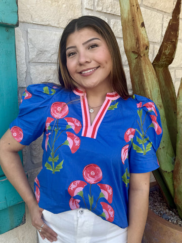 Ladies Floral Puff Sleeve Blue Top in royal blue with pink floral print, puff sleeves for volume with contrast pink/red trim neckline - T26120. Available at Blair's Western Wear, Marble Falls, TX.