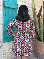 The Ivy Jane Multicolored Retro Knit Dress brings bold, vintage-inspired style to your everyday wardrobe. Its soft, sweater-knit fabric, mock-turtleneck, and 3/4 sleeves create a cozy yet polished look, while the structured silhouette flatters effortlessly. Finished with a convenient back half-zip, this eye-catching dress blends comfort and retro charm in one easy piece. Available at BLAIR'S Western Wear located in Marble Falls TX. 