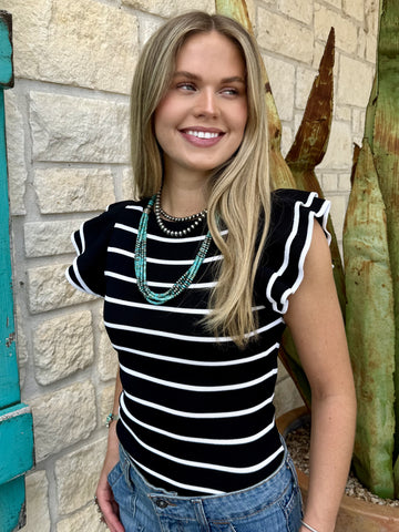 Ladies knit top in black and white stripes, soft stretch fabric with feminine ruffle sleeves - SG10573B. Available at Blair's Western Wear, Marble Falls, TX.