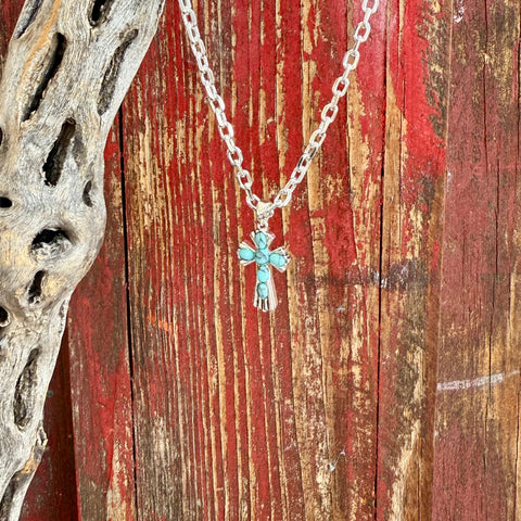 Ladies Montana Silversmiths silver-tone cross necklace with turquoise stones, handcrafted detailing, and tarnish-resistant shine – NC6319. Available at Blair's Western Wear, Marble Falls, TX.