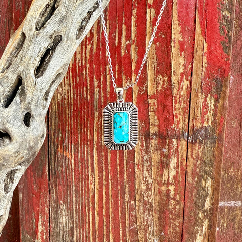 Ladies Montana Silversmiths necklace with rectangular turquoise pendant, detailed silver sunburst frame, and polished chain for everyday Western elegance - NC6110. Available at Blair's Western Wear, Marble Falls, TX.