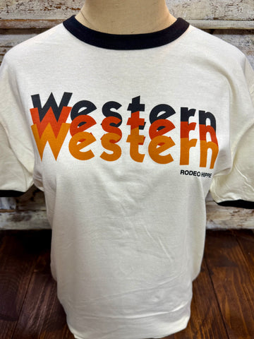 Ladies Rodeo Hippie short sleeve graphic tee in natural with black trim, soft breathable cotton blend, featuring bold Western repeat graphic in rust and black tones – WESTERN3. Available at Blair's Western Wear, Marble Falls, TX.