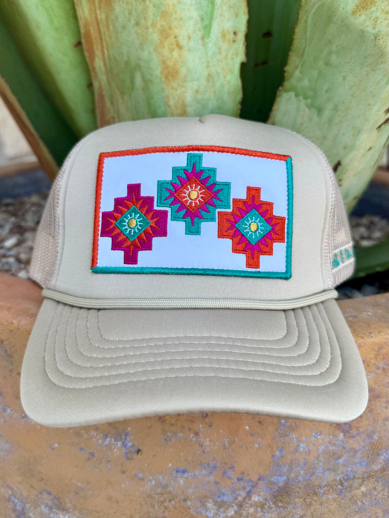 Ladies West Company mesh Aztec rope cap in beige, with bright turquoise and pink embroidery, breathable mesh back, and adjustable snap closure – H008TBEG. Available at Blair’s Western Wear, Marble Falls, TX.