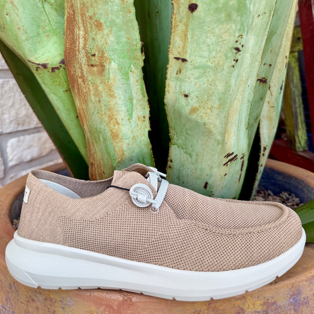 Men’s Ariat casual shoe in light tan knit, featuring a breathable upper and cushioned insole for comfort, with an adjustable lace slip-on design and lightweight EVA sole - 10064055. Available at Blair's Western Wear, Marble Falls, TX.