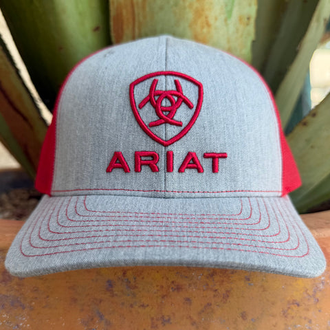 A heather gray and red trucker-style Ariat cap with red embroidered logo and stitching