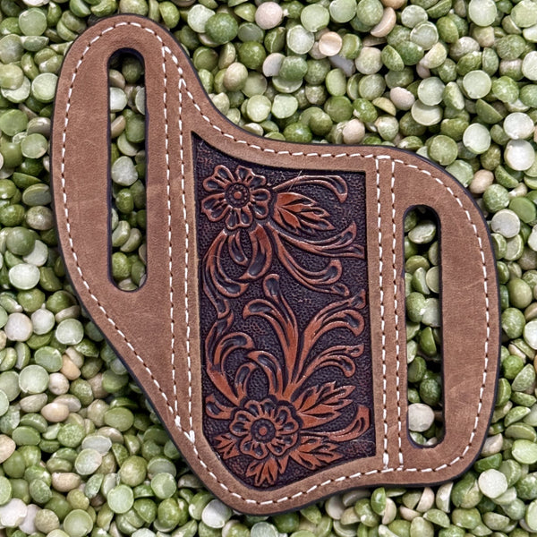 Men's Ariat Leather Sheath Knife Sheath in tan and brown, crafted from genuine leather with detailed floral tooling, with dual belt slots for secure wear - A1801444. Available at Blair's Western Wear, Marble Falls, TX.