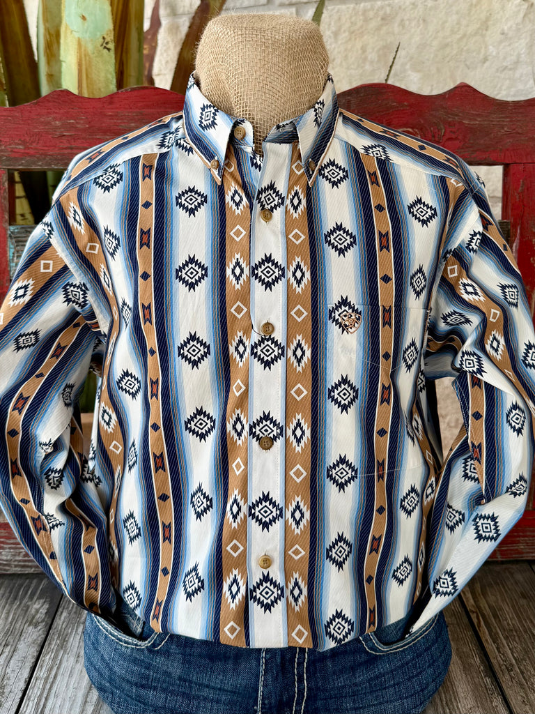 Men’s Ariat long sleeve button-down Aztec print shirt in tan, blue, and white, made with breathable cotton, featuring embroidered Ariat logo on chest pocket - 10062236. Available at Blair's Western Wear, Marble Falls, TX.