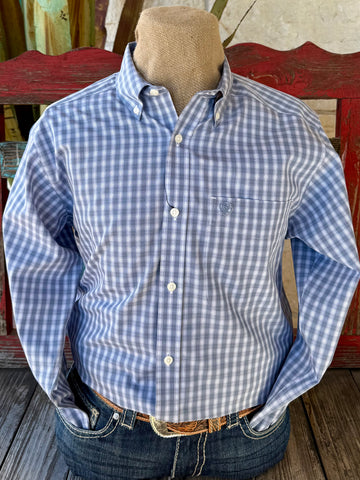 Men’s Ariat long sleeve button-down check shirt in dusty blue, featuring wrinkle-free American-grown cotton and Greater Arm Mobility for all-day comfort – 10065804. Available at Blair's Western Wear, Marble Falls, TX.