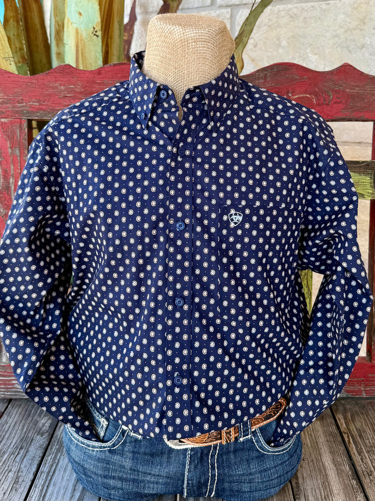 Men’s Ariat long sleeve button-down print shirt in navy/tan, made from breathable 100% cotton for all-day comfort, with a classic fit and embroidered logo pocket – 10062241. Available at Blair’s Western Wear, Marble Falls, TX.