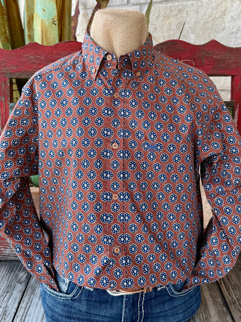 Men’s Ariat long sleeve button-down print shirt in rust and blue, made from breathable cotton for all-day comfort, with embroidered Ariat logo for authentic style - 10062239. Available at Blair's Western Wear, Marble Falls, TX.
