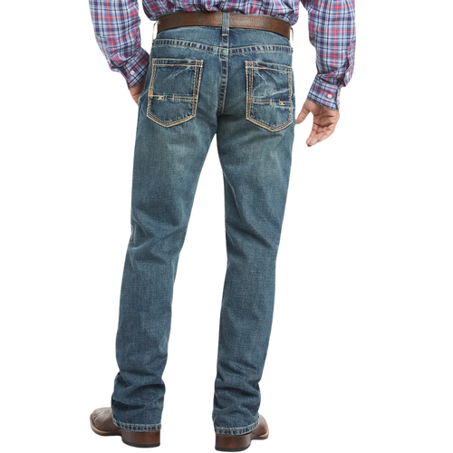 Men's relaxed fit bootcut jean in medium wash 13 oz. ring-spun cotton denim with hand-sanding and whisker details — Blair's Western Wear Marble Falls TX

