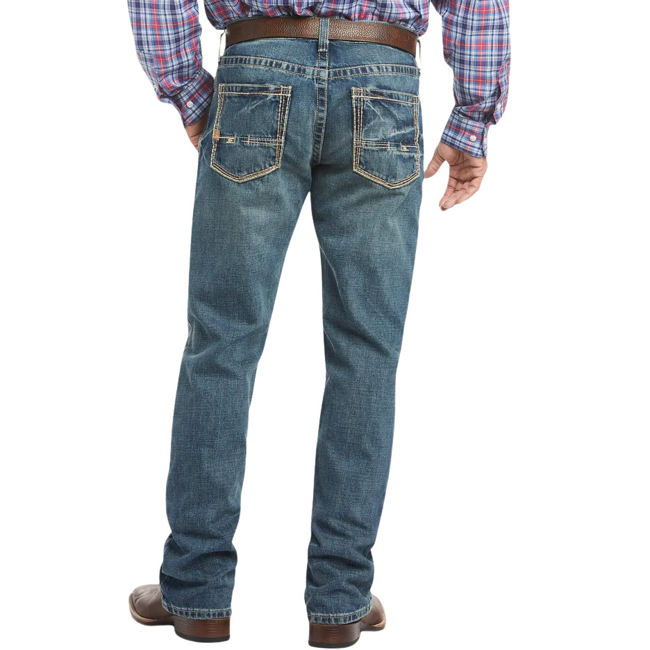 Men's relaxed fit bootcut jean in medium wash 13 oz. ring-spun cotton denim with hand-sanding and whisker details — Blair's Western Wear Marble Falls TX


