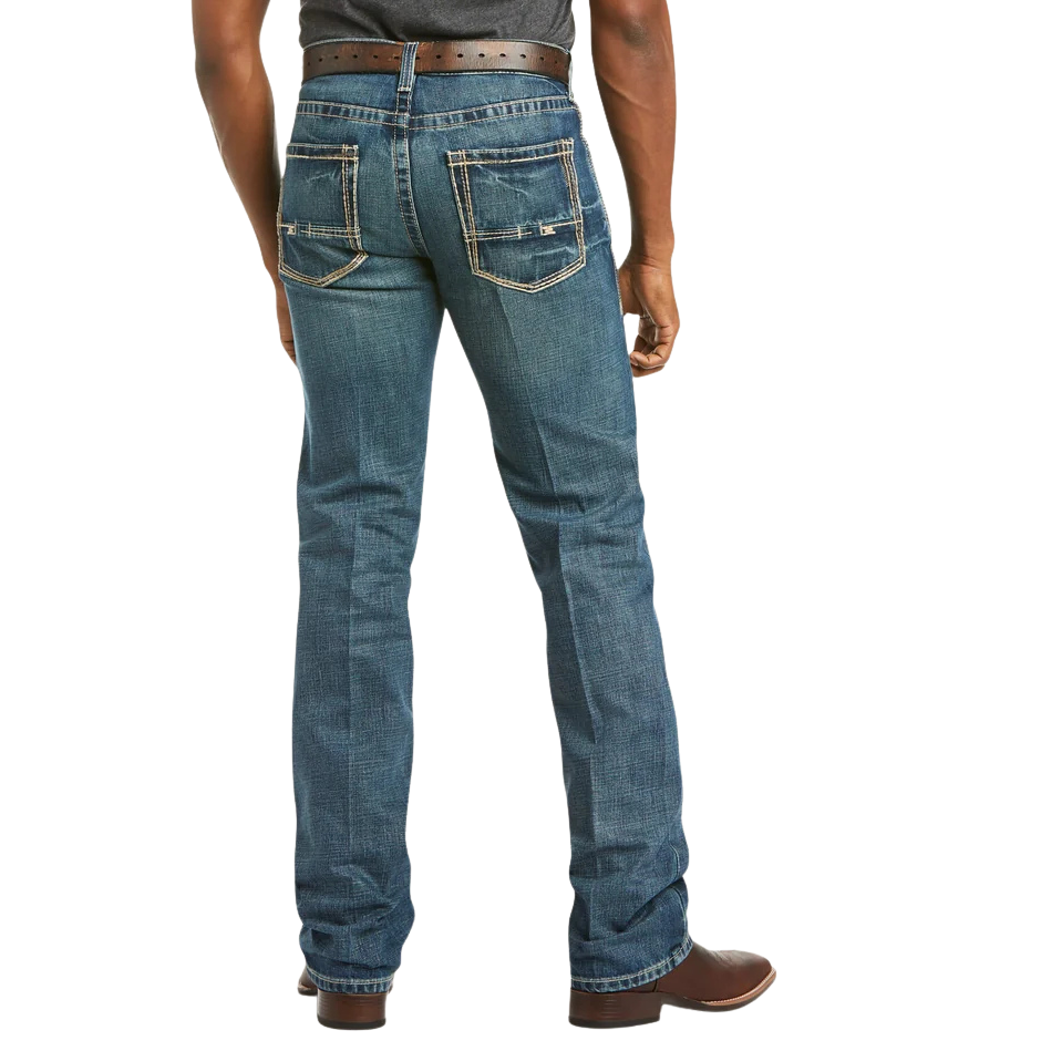 Men's slim fit straight leg jean in medium wash 13 oz. cotton denim with hand-sanding, whiskering, and embroidered back pockets — Blair's Western Wear Marble Falls TX