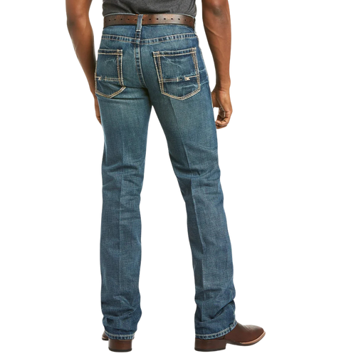 Men's slim fit straight leg jean in medium wash 13 oz. cotton denim with hand-sanding, whiskering, and embroidered back pockets — Blair's Western Wear Marble Falls TX