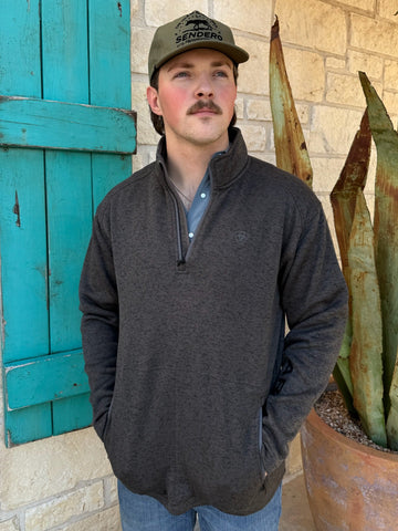 Men’s Ariat quarter zip pullover in heather gray, made from soft sweater-fleece for lightweight warmth, with zippered hand pockets for secure storage – 10073711. Available at Blair’s Western Wear, Marble Falls, TX.