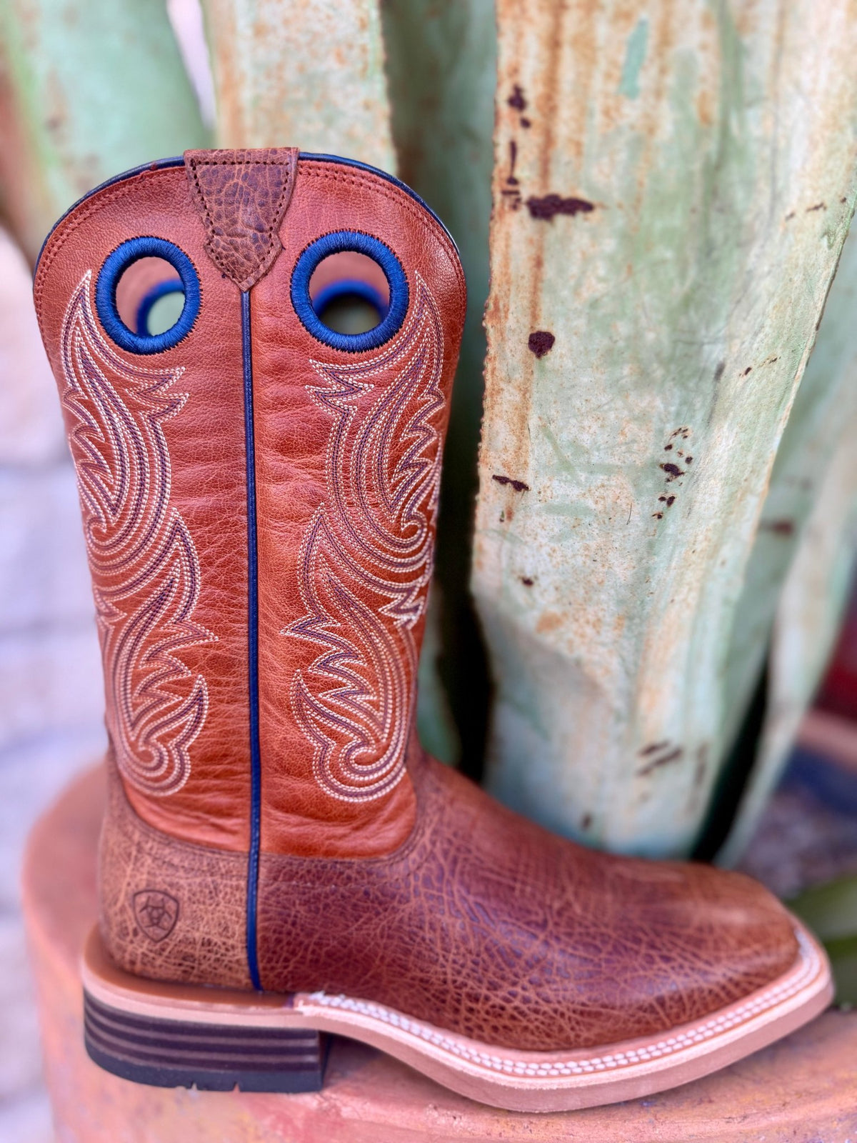 Men's Ariat Western square toe roper boot in Cottage Brown/Marigold, built from full-grain leather that resists wear and develops character over time, with a Duratread outsole for flexible traction and long-lasting performance - 10074256. Available at Blair's Western Wear, Marble Falls, TX.