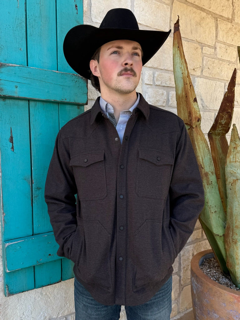 Men’s Ariat shirt jacket in heather black, made from moleskin twill for lightweight warmth, featuring snap-front closure and dual chest pockets – 10062440. Available at Blair’s Western Wear, Marble Falls, TX.