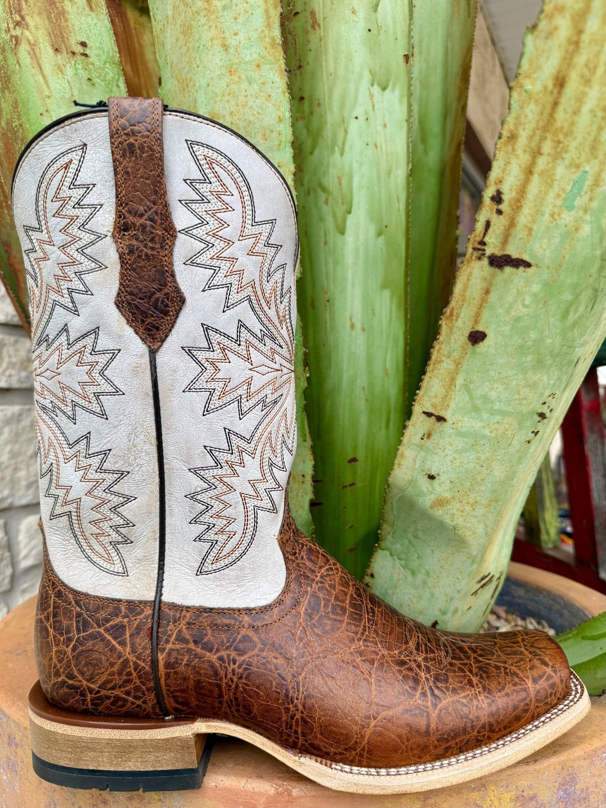 Men's Ariat Western Boot Leather Boot in Brown/Tan, full-grain textured leather that resists scuffs while maintaining a rugged look, with TekStep outsole for slip-resistant traction - 10074242. Available at Blair's Western Wear, Marble Falls, TX.