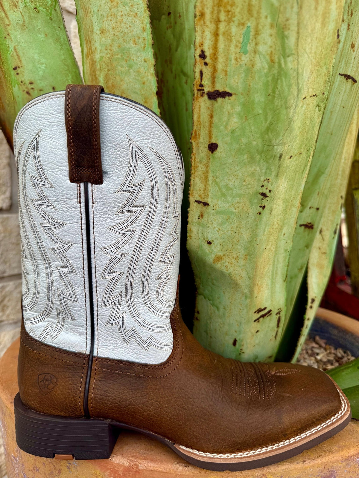 Men’s Ariat Western square toe boot in Mustang Brown/Smokey Cream, built with full-grain leather for long-lasting comfort, with a cushioned 4LR™ footbed and flexible rubber outsole – 10074165. Available at Blair's Western Wear, Marble Falls, TX.