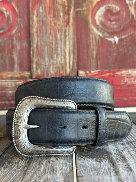 Black leather with deep caiman print scaling and a clean tapered tip — bold exotic texture with a sleek, all-black finish. A statement belt that pairs with virtually anything in your western wardrobe.