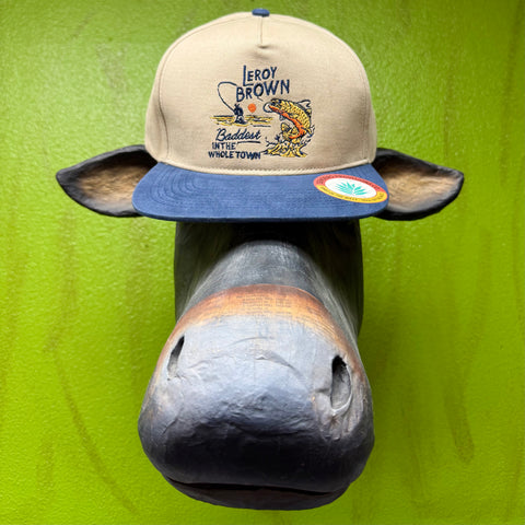 Men's Burlebo cap with embroidered fish graphic in khaki and navy, featuring a structured crown and adjustable snapback closure - LEROY BROWN 2. Available at Blair's Western Wear, Marble Falls, TX.