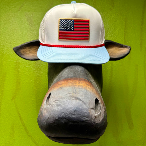 Men's Burlebo cap rope style in white and light blue, embroidered American flag patch on structured front, with breathable mesh back and adjustable snap closure - PCOGLORY. Available at Blair's Western Wear, Marble Falls, TX.