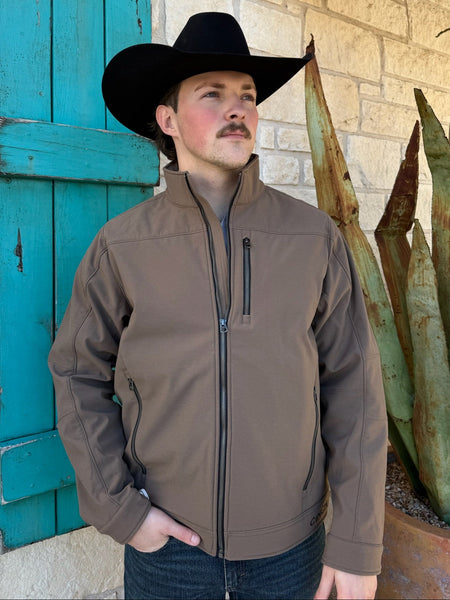 Men’s CINCH bonded concealed carry jacket in brown, featuring dual concealed carry pockets and a wind- and water-resistant softshell exterior – MWJ1539005. Available at Blair’s Western Wear, Marble Falls, TX.