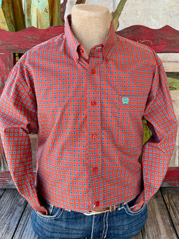 Men’s CINCH long sleeve button-down print shirt in brick and blue, made from breathable cotton with a bold geometric medallion pattern, featuring turquoise logo embroidery and red buttons – MTW1105935. Available at Blair’s Western Wear, Marble Falls, TX.