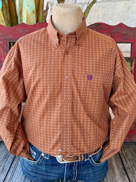 Men’s CINCH long sleeve button-down print shirt in rust with white and purple geometric pattern, featuring breathable cotton fabric and embroidered logo chest pocket – MTW1105978. Available at Blair’s Western Wear, Marble Falls, TX.