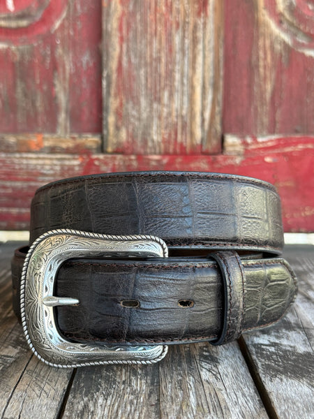Rich chocolate caiman print leather with a clean tapered profile and a large engraved silver western buckle with rope edge detail — bold exotic texture with a warm, earthy finish that pairs with virtually anything in your western wardrobe.