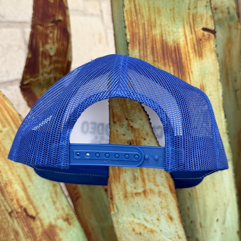 A blue mesh back trucker hat shown from the back