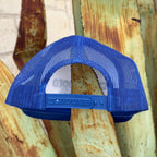A blue mesh back trucker hat shown from the back
