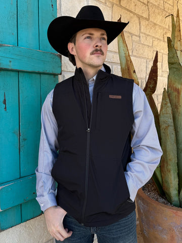 Men’s Cinch canvas zip vest in black, built from durable poly-canvas with quilted lining, featuring water-repellent finish and secure zip pockets – MWV1927001. Available at Blair’s Western Wear, Marble Falls, TX.