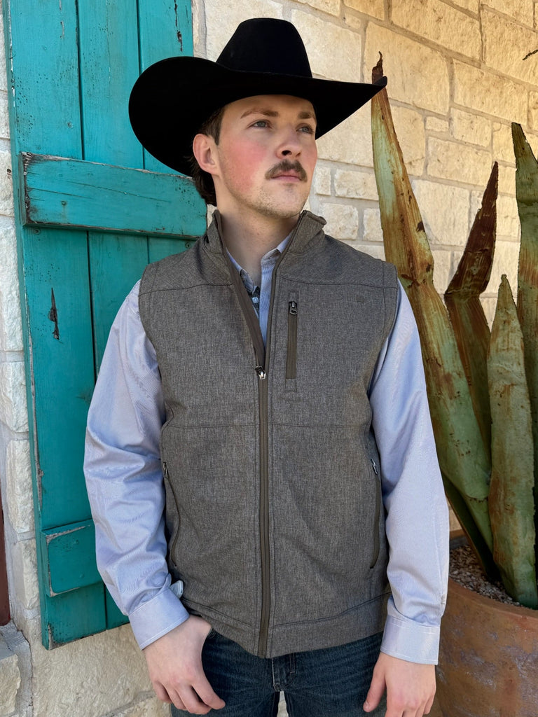 Men’s Cinch Concealed Carry Bonded Vest in Charcoal/Gray, with wind- and water-resistant bonded fabric, and secure dual concealed carry pockets - MWV1541011. Available at Blair's Western Wear, Marble Falls, TX.