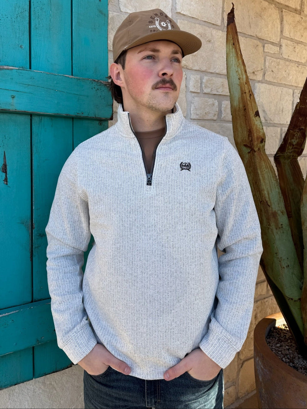 Men’s Cinch grey quarter zip pullover sweater, featuring soft sweater-knit fleece, ribbed cuffs and embroidered chest logo – MWK1080018. Available at Blair’s Western Wear, Marble Falls, TX.