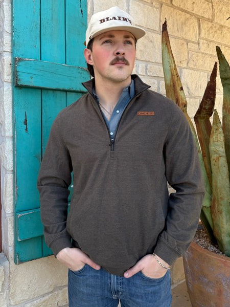 Men’s Cinch quarter-zip pullover in olive, made from a soft midweight cotton blend for all-day comfort, with rib-knit cuffs and waistband to retain shape - MWK1913003. Available at Blair's Western Wear, Marble Falls, TX.