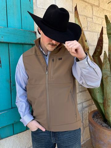 Men’s Cinch windproof vest in khaki, built with a water-resistant shell and micro-fleece lining for lightweight warmth – MWV1099011. Available at Blair’s Western Wear, Marble Falls, TX.
