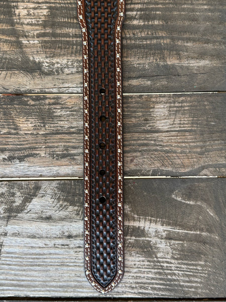 Dark chocolate basketweave tooled leather with diamond-shaped engraved silver conchos, silver dome studs along the edges, cream contrast stitching, and a large engraved silver western buckle — a premium, heavily detailed belt built for the man who doesn't do anything halfway.