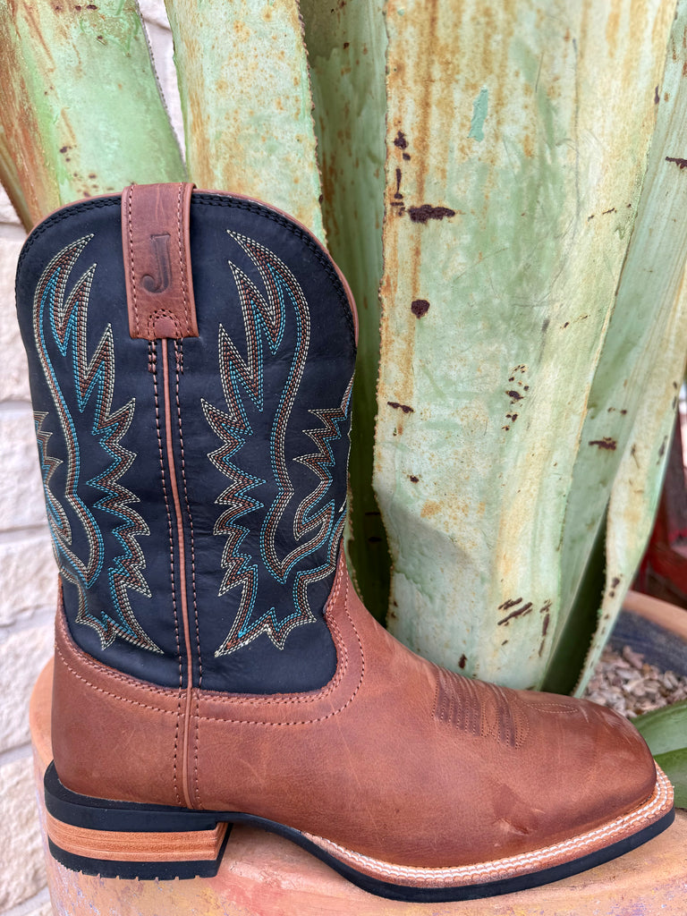 Men’s Justin Western Boot square toe boot in oil tan, crafted from oil-tanned leather for flexible comfort, with a cushioned insole for all-day support – OL7330. Available at Blair's Western Wear, Marble Falls, TX.