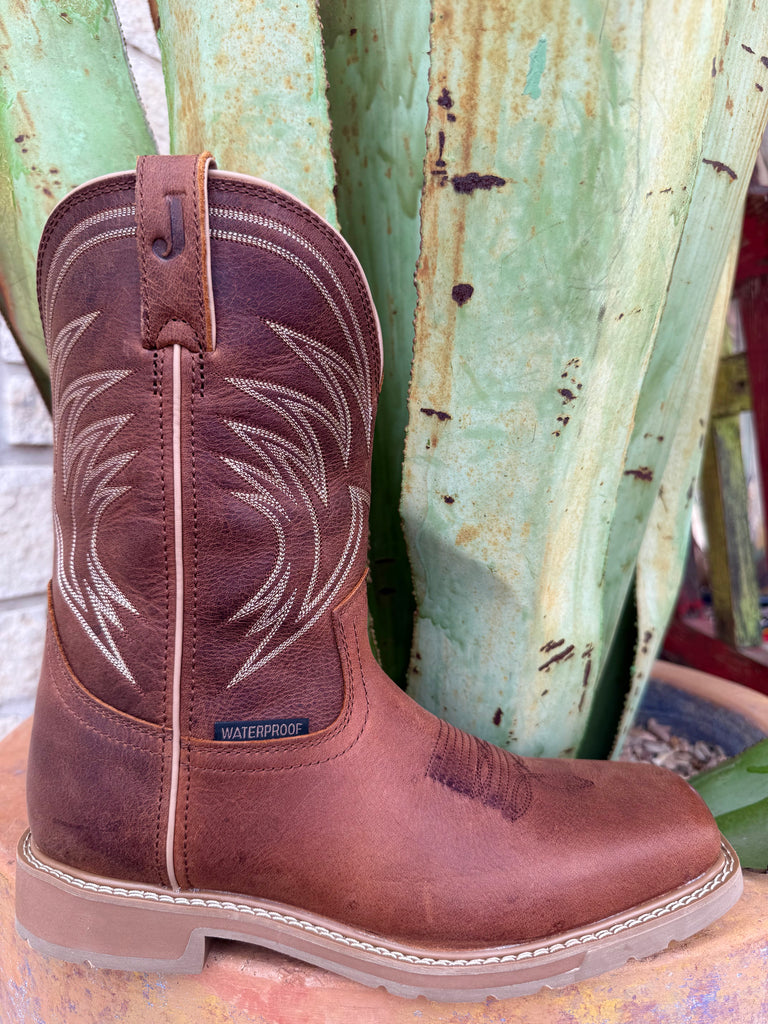 Men’s Justin Work square toe boot in brown, built with full-grain leather that softens with wear, with waterproof construction for dry comfort - SE4242. Available at Blair's Western Wear, Marble Falls, TX.