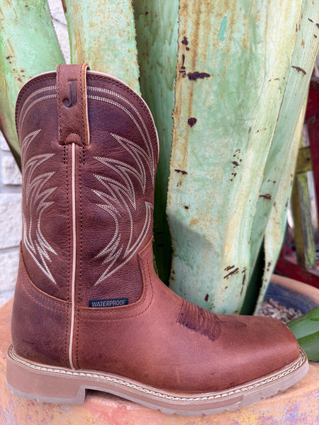 Men’s Justin Work square toe boot in brown, built with full-grain leather that softens with wear, with waterproof construction for dry comfort - SE4242. Available at Blair's Western Wear, Marble Falls, TX.
