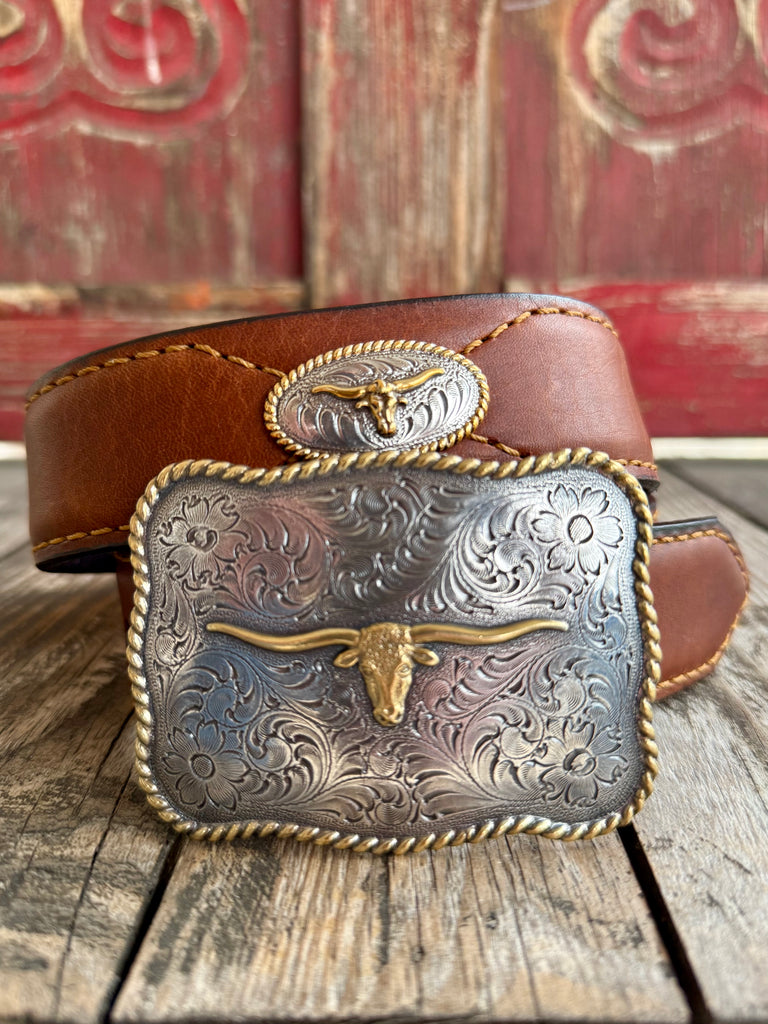 Men's Nocona Belt Western Longhorn Concho Belt in Brown, full-grain leather strap that molds comfortably with wear, with engraved floral buckle featuring raised gold longhorn centerpiece - VB8102. Available at Blair's Western Wear, Marble Falls, TX.