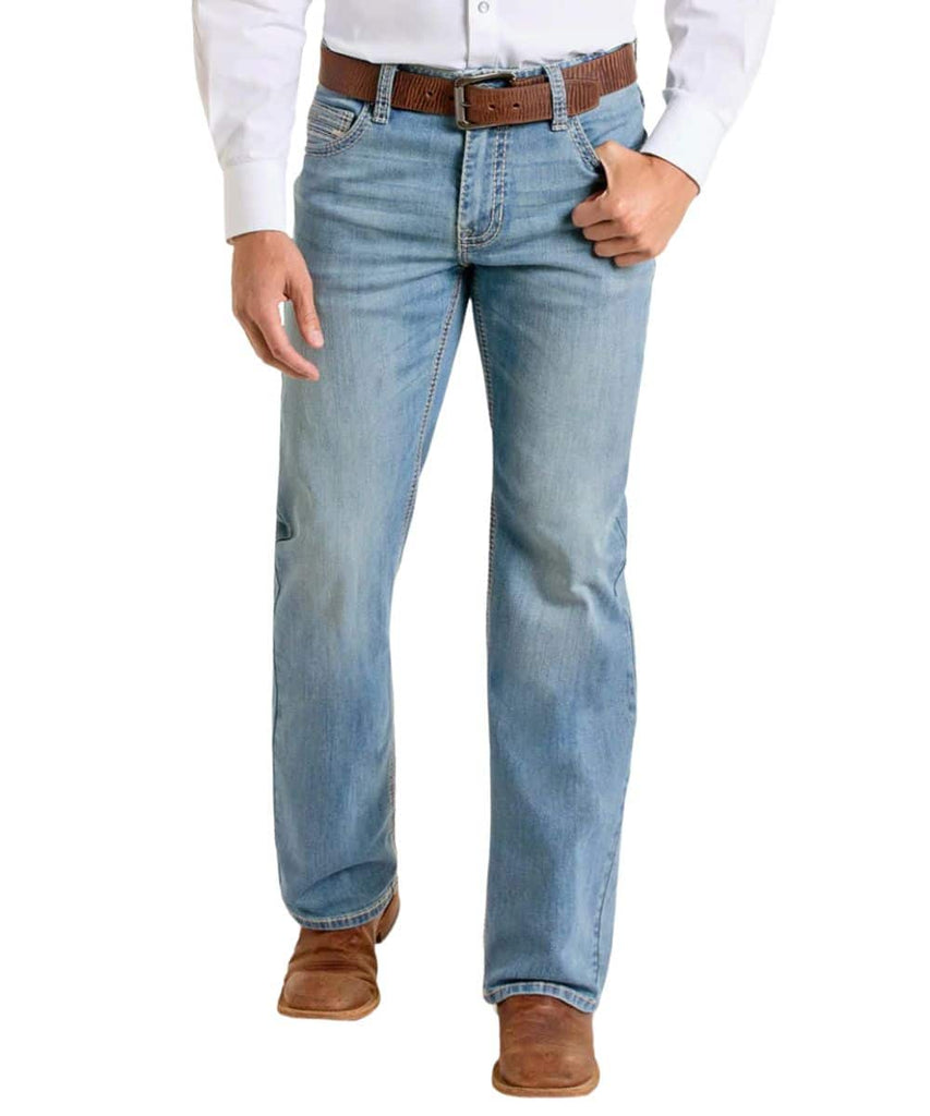 Men’s Panhandle Slim boot cut jean in medium wash, designed to fit over western boots without stacking, with durable double barrel construction for long-lasting wear – BM0SD06687. Available at Blair's Western Wear, Marble Falls, TX.