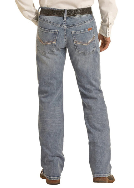 Men’s Panhandle Slim boot cut stackable jean in medium wash, designed to stack naturally over boots, with reinforced five-pocket styling for everyday durability – VMSPD03713. Available at Blair's Western Wear, Marble Falls, TX.