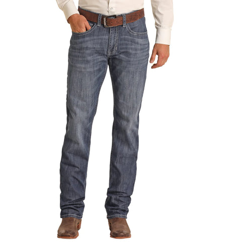 Men’s Panhandle Slim boot cut denim jeans in medium wash, designed to stack naturally over boots for extended leg coverage, with reinforced stitching for long-lasting wear – MTB3482. Available at Blair's Western Wear, Marble Falls, TX.
