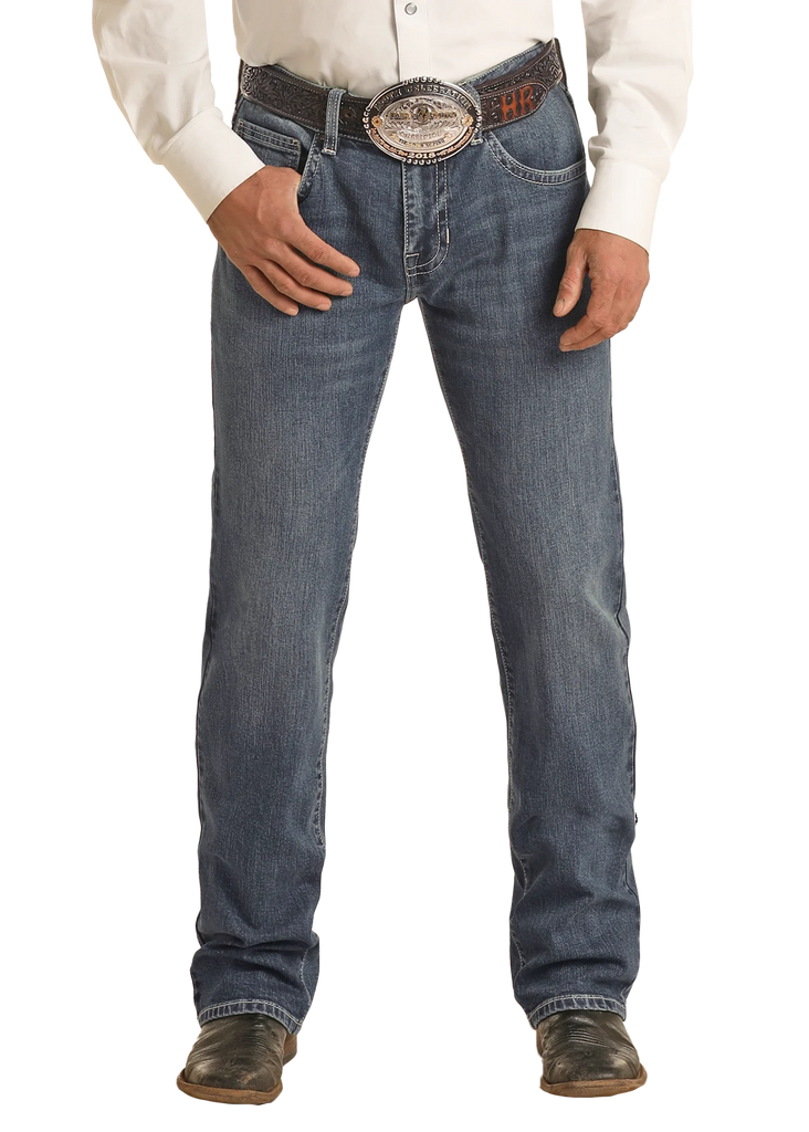 Men’s Panhandle Slim bootcut pistol stack jean in medium wash, slim pistol fit through seat and thigh, with bootcut leg that stacks cleanly over boots – VMSPD03714. Available at Blair's Western Wear, Marble Falls, TX.